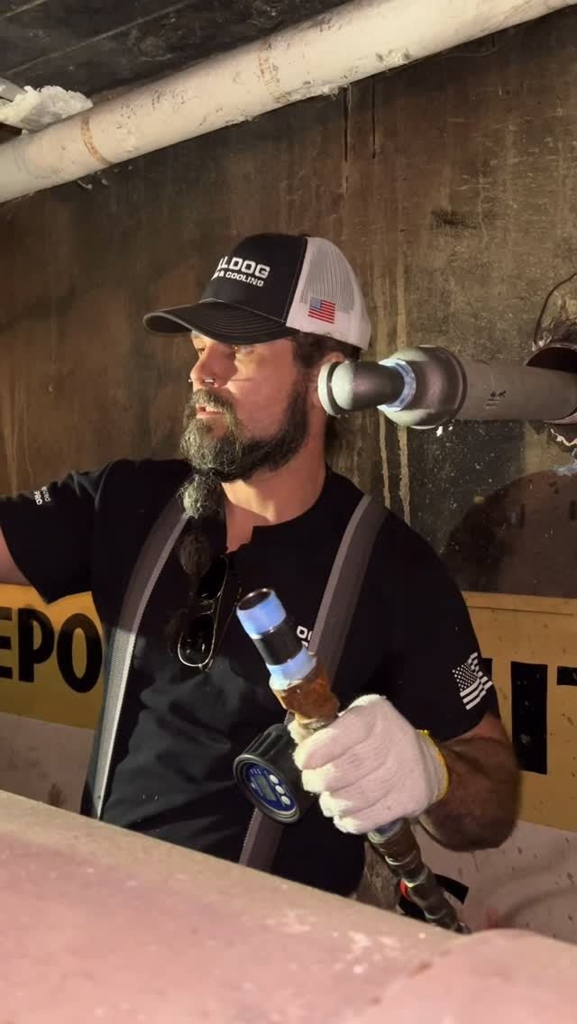 Bulldog technician brazing a refrigerant line set