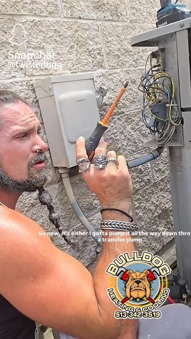 Technician working on an outdoor electrical disconnect